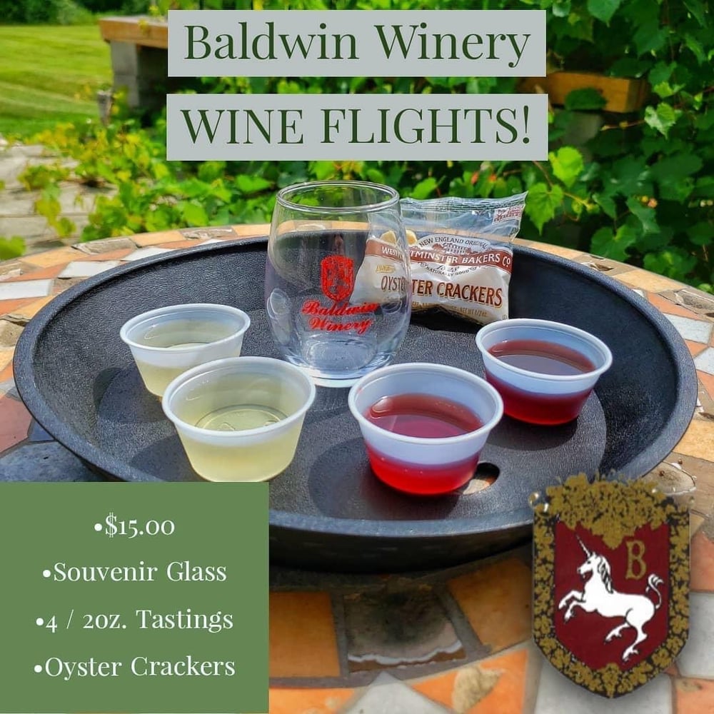 wine flights include four two ounce samples, a glass, and oyster crackers